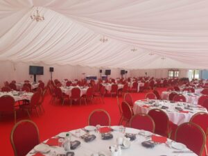 Corporate Marquee Set Up with Red Theming